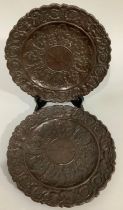 A pair of 19th century brown drabware pottery plates, heavily moulded with acanthus leaves and