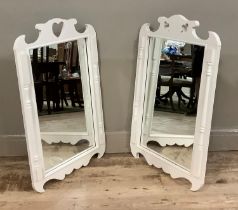 Two cream painted wall mirrors with cut out heart and spade motifs to the cresting