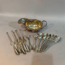 A collection of 20th century silver plate including a sauce boat, six kings pattern coffee spoons,