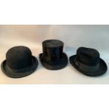 A black bowler hat by Moores and another by G A Dunn, London together with a black top hat with