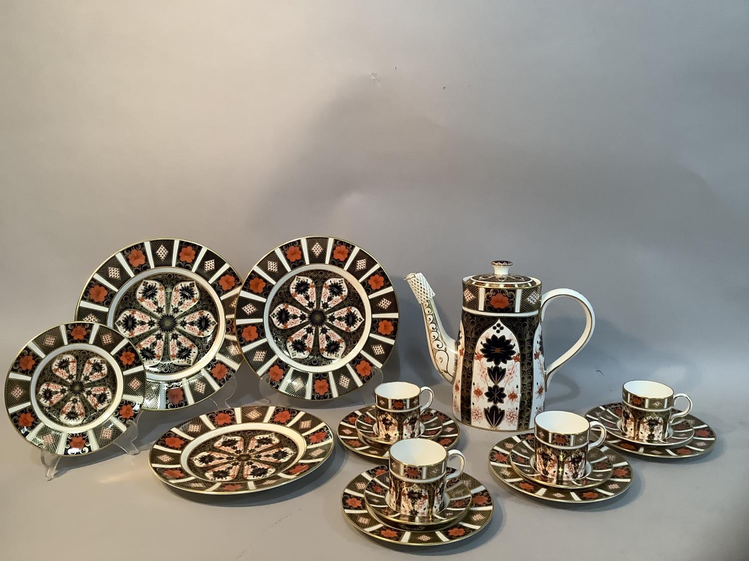 A Royal Crown Derby Old Imari pattern no.1128 coffee service comprising a coffee pot, four coffee - Image 2 of 3