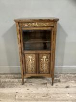 A Victorian rosewood music cabinet inlaid with ivorine and boxwood having a half glazed and panelled
