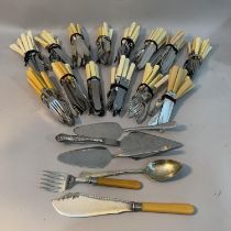 A large quantity of fish knives and forks in sets, servers, cake slices etc