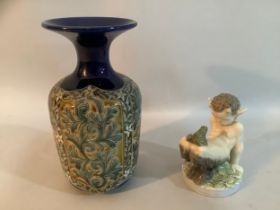 Royal Copenhagen figure of a satyr with frog, 12cm high, together with a Doulton Lambeth stoneware
