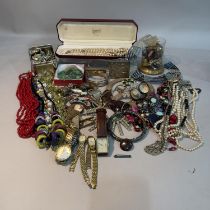 A collection of 20th century costume jewellery including a bar brooch, wrist watches, silver shell