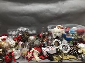 A quantity of gold, silver and red baubles, decorations and bells in three boxes