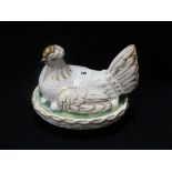 A Staffordshire Pottery Hen On Nest With Gilt Highlights