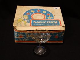 A Boxed Set Of Six Babycham Glasses