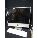 An Apple IMAC Computer & Keyboard