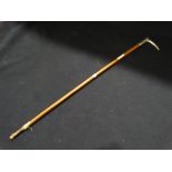 An Antique Riding Crop With Plated Handle & Silver Band