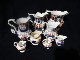 A Group Of Gaudy Welsh Pottery Jugs