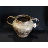 A Two Handled Beaten Copper Vase With Stylized Floral & Armorial Motifs, 9" High