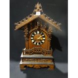 An Early 20thc Black Forest Type Mantel Clock With Cuckoo Movement