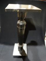 An Ebonized Torchere Stand