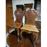 A Pair Of Victorian Mahogany Shield Back Hall Chairs
