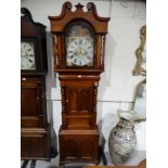 An Antique Mahogany Encased Long Case Clock, With Arched Painted Dial With Lion & Moving Eyes,