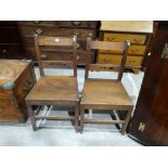 A Pair Of Antique Oak Farmhouse Chairs