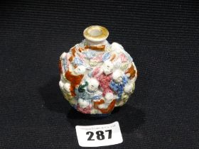 A 19thc Moulded Porcelain "Eighteen Luohan" Snuff Bottle, Four Character Seal Mark To The Base, 3"