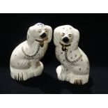 A Pair Of Beswick Pottery Staffordshire White Seated Dogs