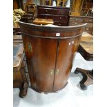 A 19thc Bow Front Two Door Hanging Corner Cupboard