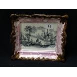 A Dixon Sunderland Pink Lustre Decorated Wall Plaque With Transfer Landscape & Figure Panel,