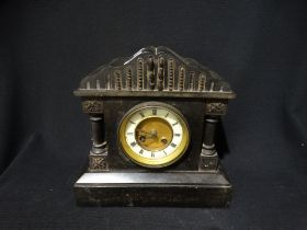 A Victorian Black Marble Encased Mantel Clock With Circular Dial