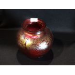 A Red Ground Iridescent Glass Globular Vase, 6.5" High