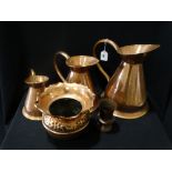 A Set Of Three Graduated Copper Measuring Jugs Etc (5)