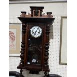 A Late Victorian Pendulum Wall Clock With Circular Dial