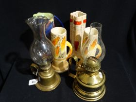 A Pair Of Brass Bedroom Oil Lamps, Together With Four Art Deco Pottery Jugs