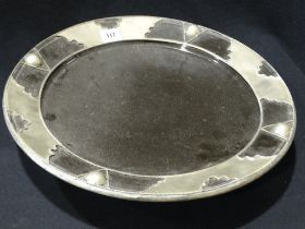 An Eastern Pottery Circular Raised Dish With Plated Mounts, 16" Dia