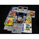 Two Nintendo Game Boy Consoles, Together With A Game Boy Advance & A Qty Of Games & Accessories