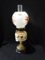A Brass Column Circular Based Oil Lamp With Milk Glass Bowl