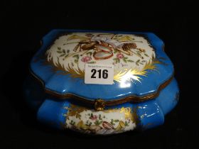 A Sevres Porcelain Lidded Casket With Panel Of Musical Instruments To The Lid