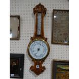 An Edwardian Oak Encased Wall Barometer