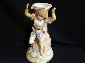 A Late Victorian Continental Porcelain Centre Piece Pedestal, Modelled As A Child Against A Marble