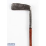 A Compston 100% patent putter stamped with no. 725435 to the blade showing the deliberate shaft bend