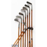 9x Assorted irons to incl' left hand Alex Patrick of Leven Acme round back mid iron, JH Taylor