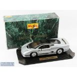 Maisto Jaguar XJ220 Diecast Model Toy: 1:12 Scale 1992 Silver on black plastic base in original box