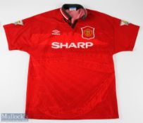1994/96 Manchester United home football shirt in red, with ‘Champions 1993/94 sleeve badges, short