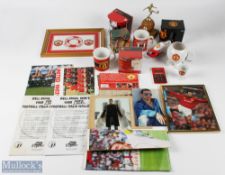 Manchester United football collectables featuring a tray, lamp shade, mugs, cups, socks, coasters,