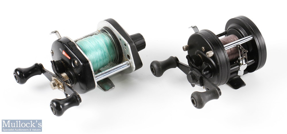 ABU Garcia Ambassadeur Five Multiplier Reel in black with twin handles, sliding line guide, runs