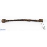 An unusual whale bone shaft priest 11" with weighted ends, with cord loop