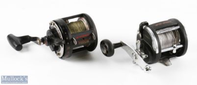 Mitchell Overseas 20 Multiplier Reel in black finish with black handle, with drag adjuster and check
