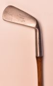 Early Bussey & Co London Thistle Patent steel socket mid iron with concave face - and fitted with