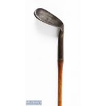 Bussey & Co London mashie niblick showing the maker's arrow cleek mark and unusual face markings,