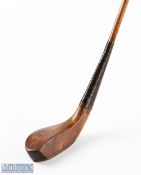 T Morris St Andrews short spoon in dark stained beech wood c1885 with a feint Morris mark to the