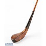 T Morris St Andrews short spoon in dark stained beech wood c1885 with a feint Morris mark to the