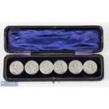 Early 20th century cased set of 6 White Metal Buttons each having a period golfer relief design to