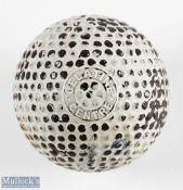 The Ace Gelatine Centre bramble pattern golf ball showing the clear maker's marks to both poles,